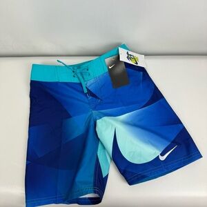Nike BOYS swim trunks. ‎ NWT size XL and small.